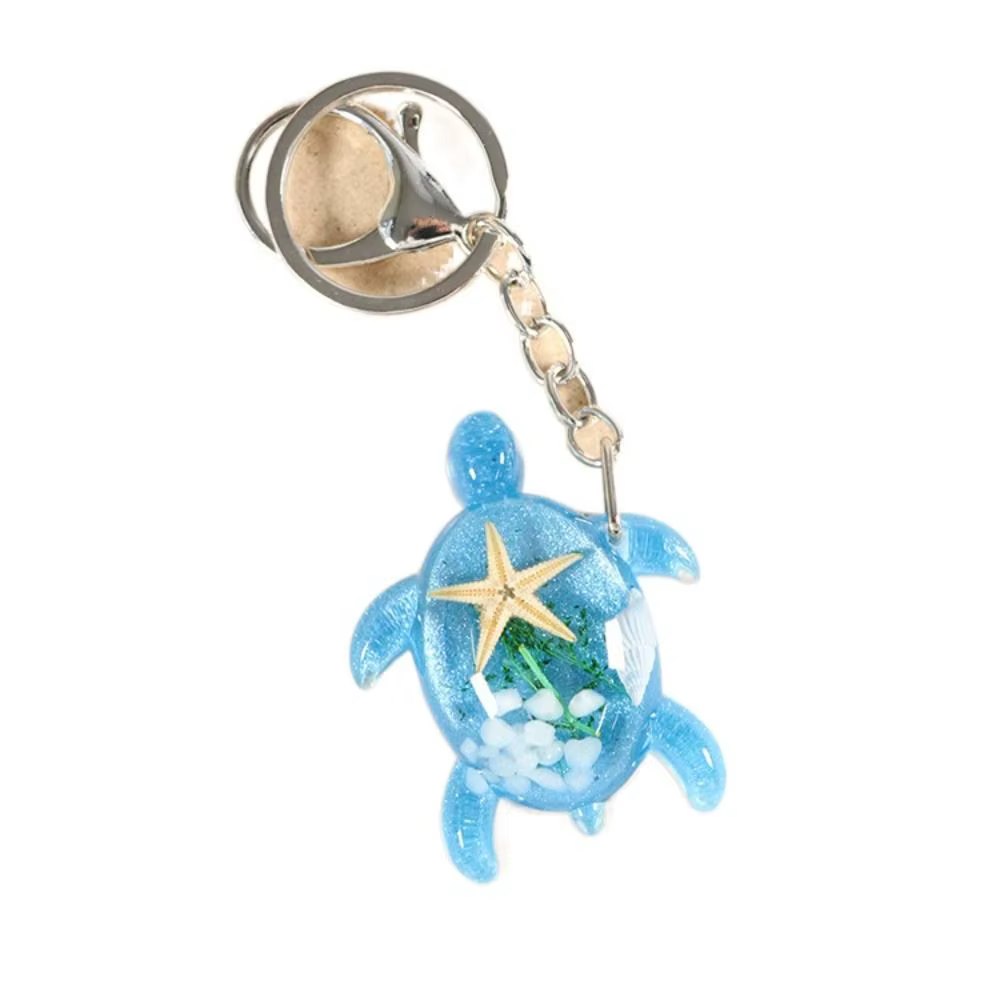 Porte-clés petite tortue qui brille dans le noir, dessin animé, étoile de mer, tortue lumineuse, col