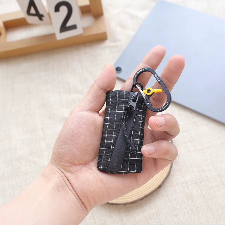 Pochette à monnaie Trail Coin Pouch ultralégère 5,8g en UHMWPE, mini pochette zippée en Gridstop rec