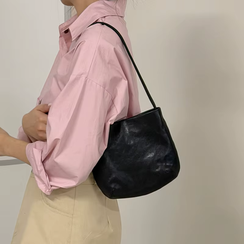 Sac fourre-tout pour femme en cuir véritable, fin et minimaliste, idéal pour les trajets quotidiens 