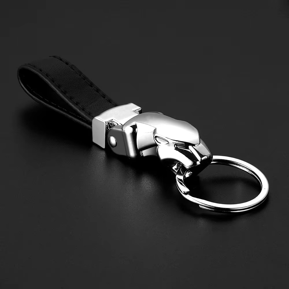Style de voiture luxe tête de léopard en cuir véritable porte-clés