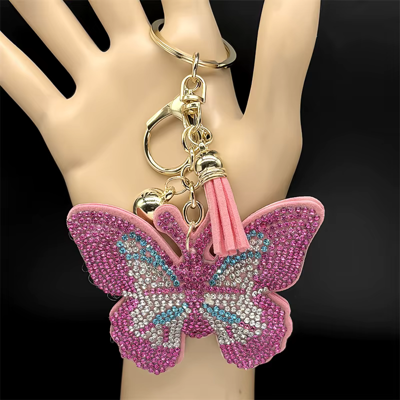 Porte-clés papillon rose pour femmes et hommes, cristal brillant, strass, pompon, sac de voiture, décoration suspendue, bijoux cadeaux