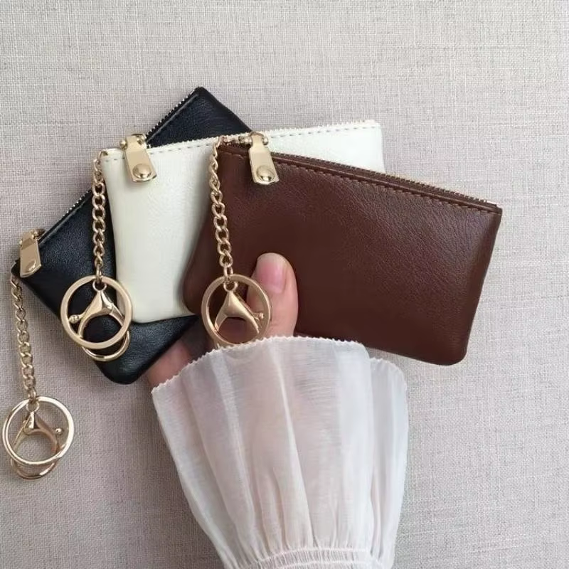 Mini porte-monnaie en cuir PU avec porte-clés doré et fermeture éclair lisse, parfait pour un usage quotidien, pour transporter cartes, argent, clés et petits objets.