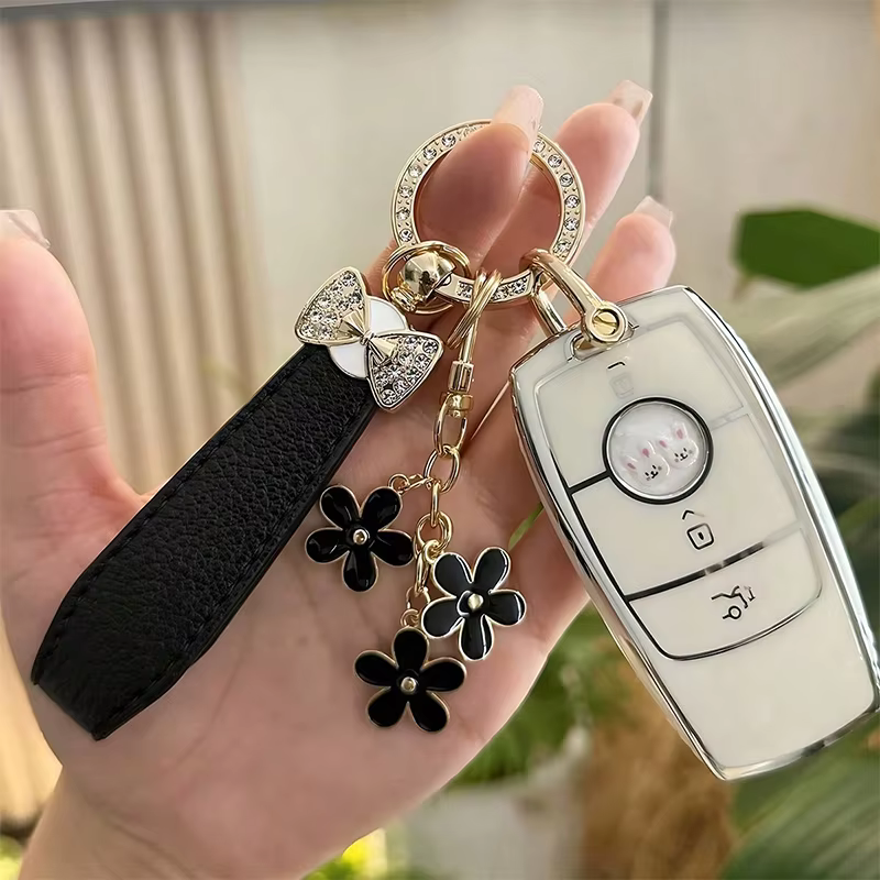 Porte-clés de luxe avec nœud et fleur