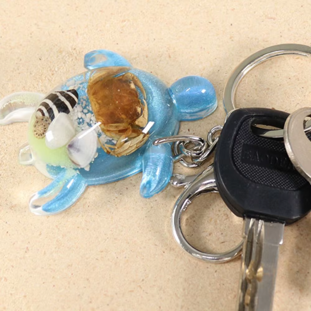 Porte-clés petite tortue qui brille dans le noir