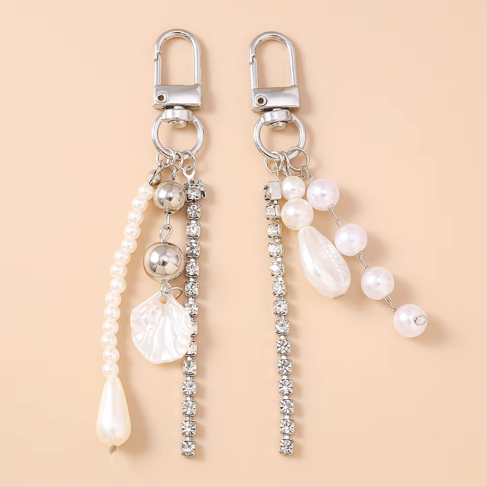 Joli porte-clés en forme de coquille de perles pour femmes et filles