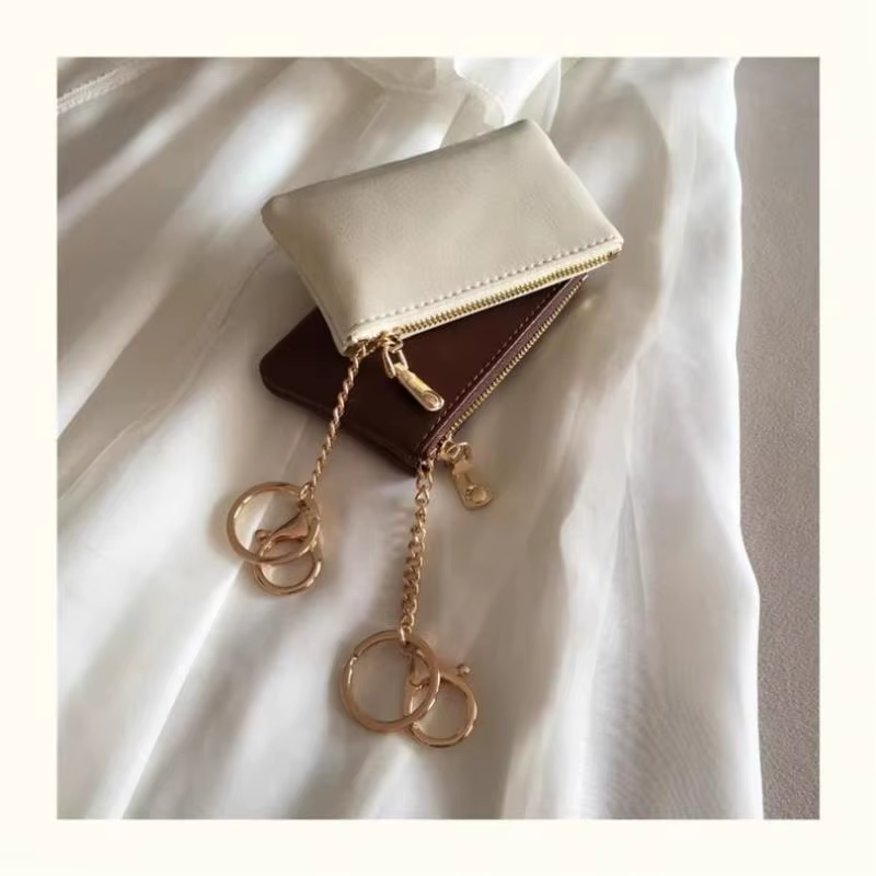 Mini porte-monnaie en cuir PU avec porte-clés doré et fermeture éclair lisse, parfait pour un usage quotidien, pour transporter cartes, argent, clés et petits objets.