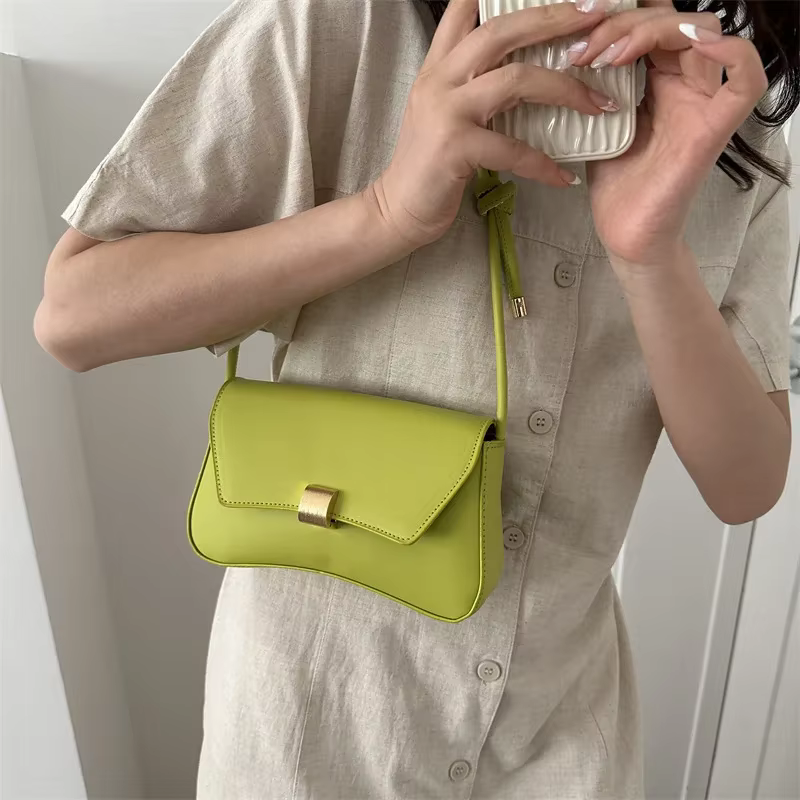 Sac à bandoulière en cuir de couleur unie pour femmes