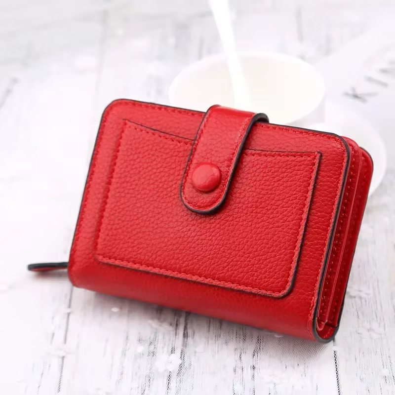 Mini porte-monnaie en cuir avec moraillon pour femme