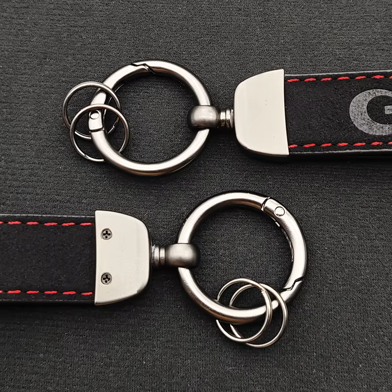 Porte-clés en cuir de luxe de haute qualité pour hommes et femmes