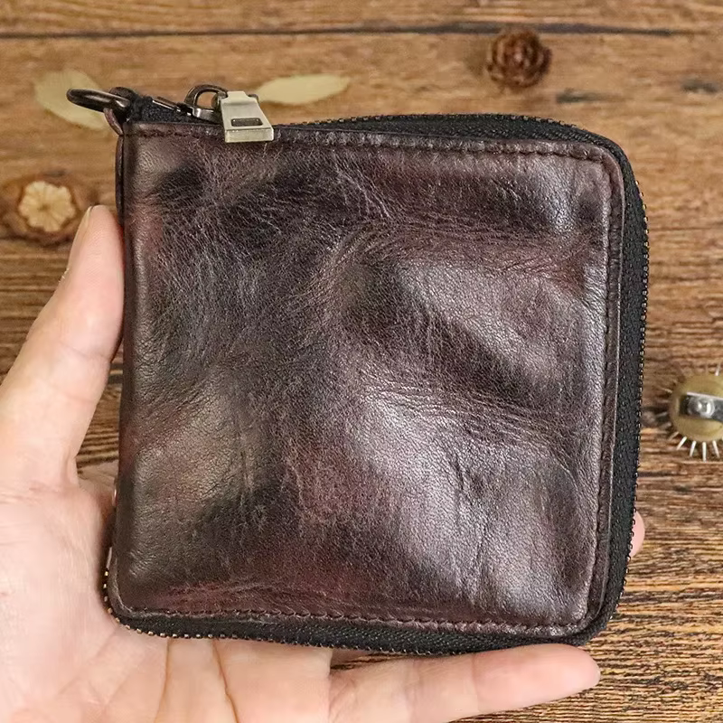 Portefeuille court vintage pour homme simple en cuir véritable doux avec fermeture éclair multi-fonctions porte-monnaie pour homme en cuir de vachette naturel petit sac d'argent avec poche à moraillon