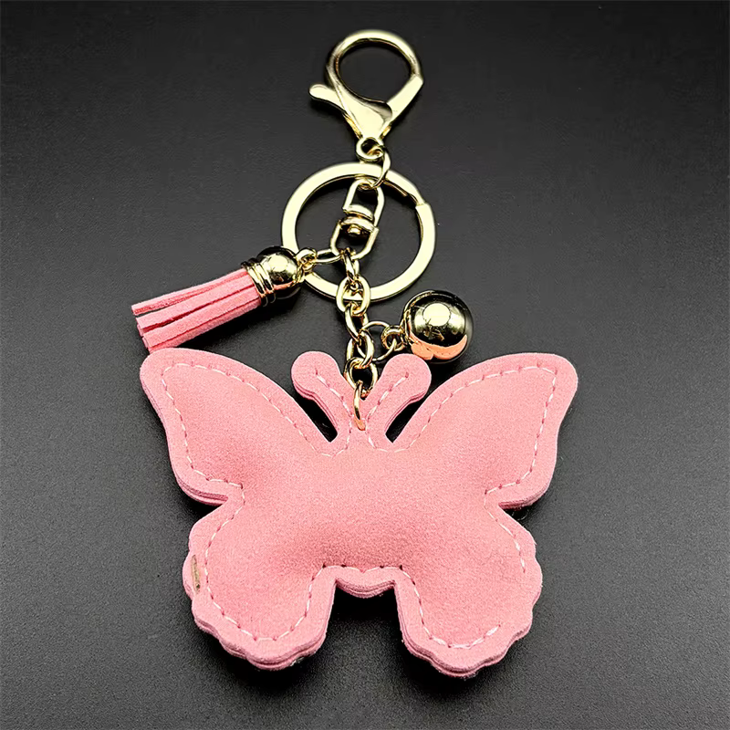 Porte-clés papillon rose pour femmes et hommes, cristal brillant, strass, pompon, sac de voiture, décoration suspendue, bijoux cadeaux