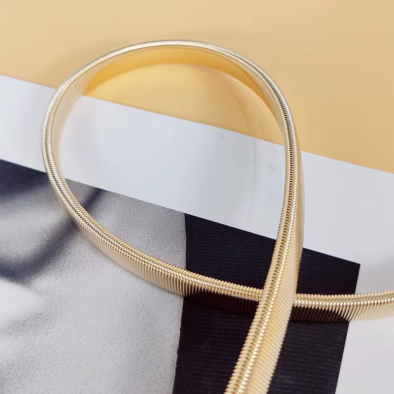 Haute qualité luxe Desiner femmes strass flore élastique chaîne en métal ceinture femme doré élégant taille