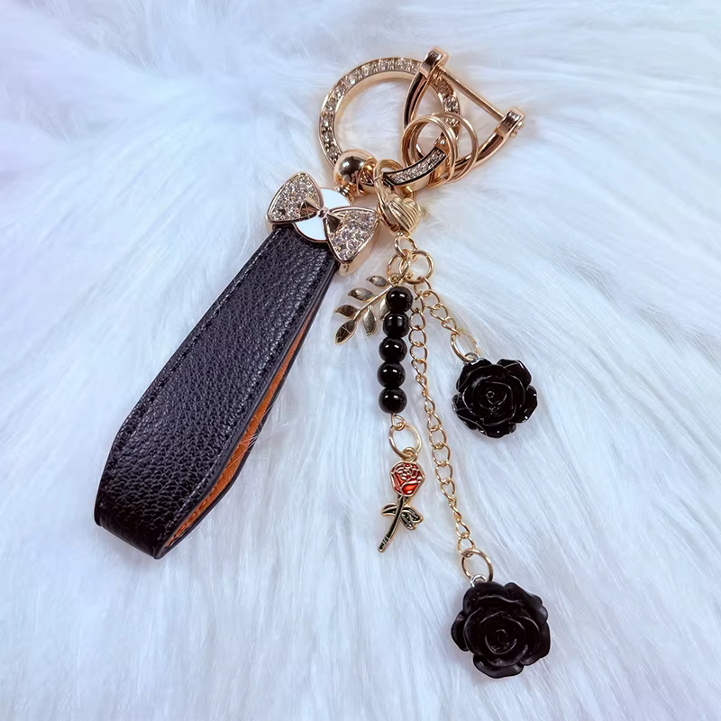Porte-clés de luxe avec nœud et fleur