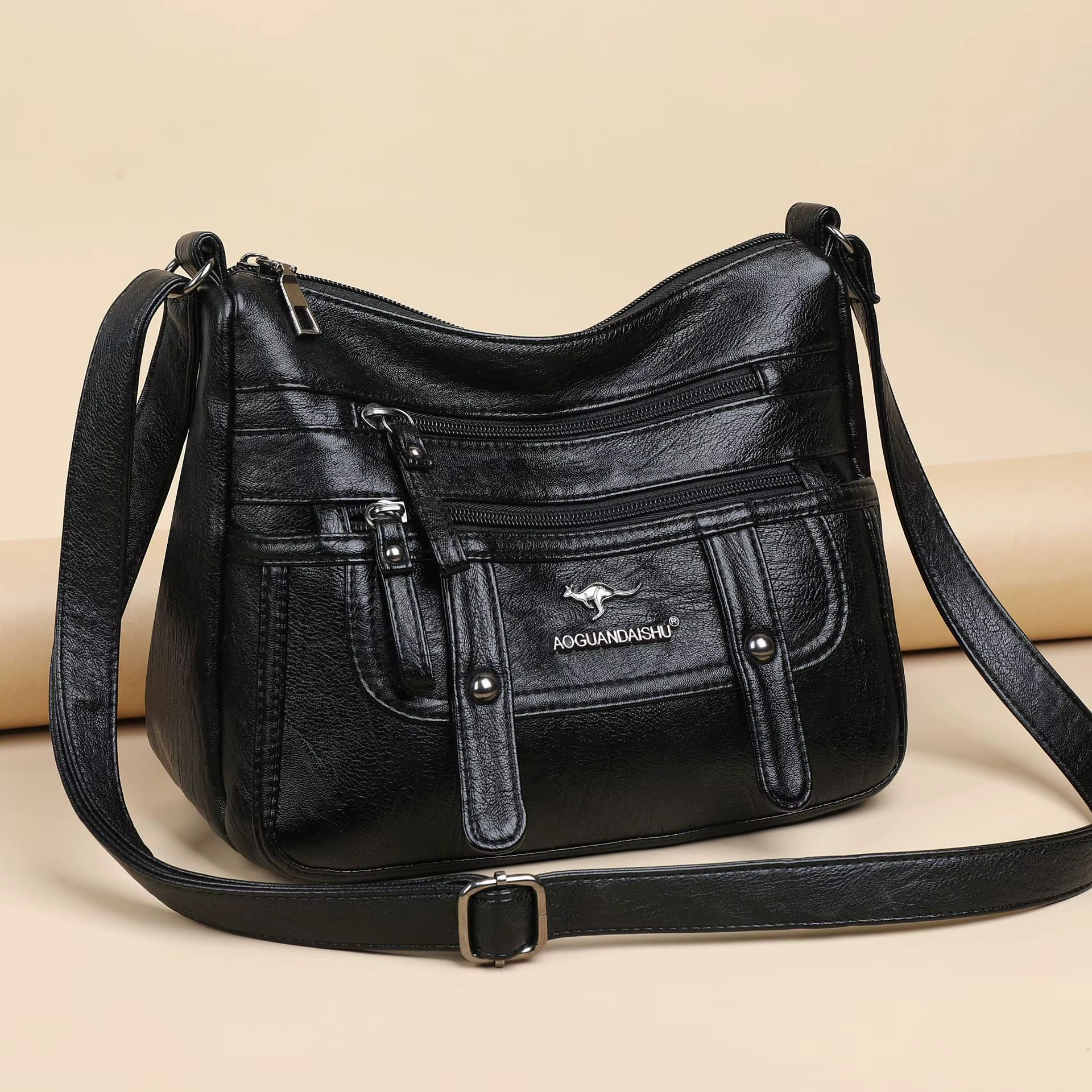 Sac à bandoulière pour femme en cuir souple