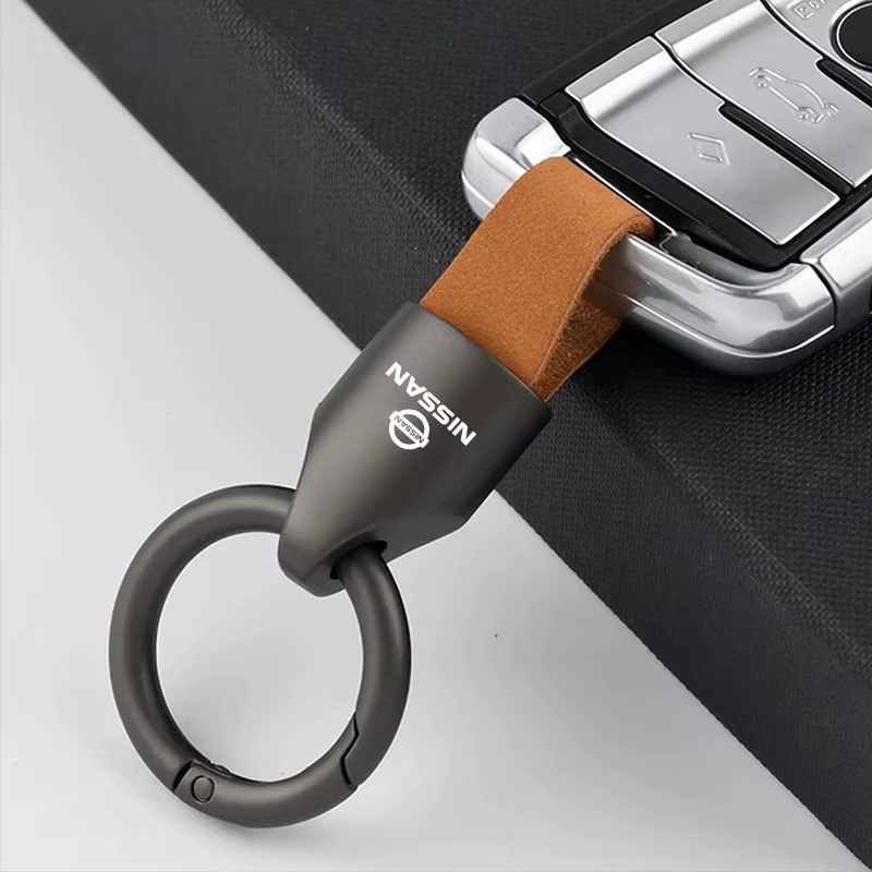 Porte-clés de luxe en daim/métal pour hommes et femmes