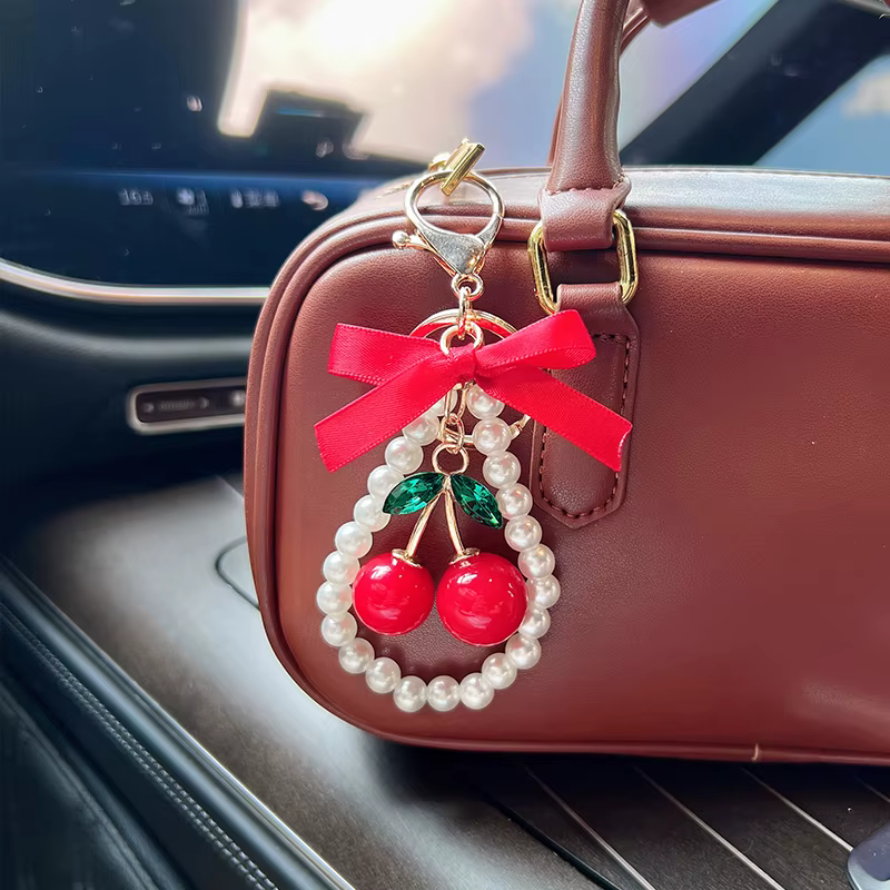 Porte-clés créatif cerise avec nœud et perles